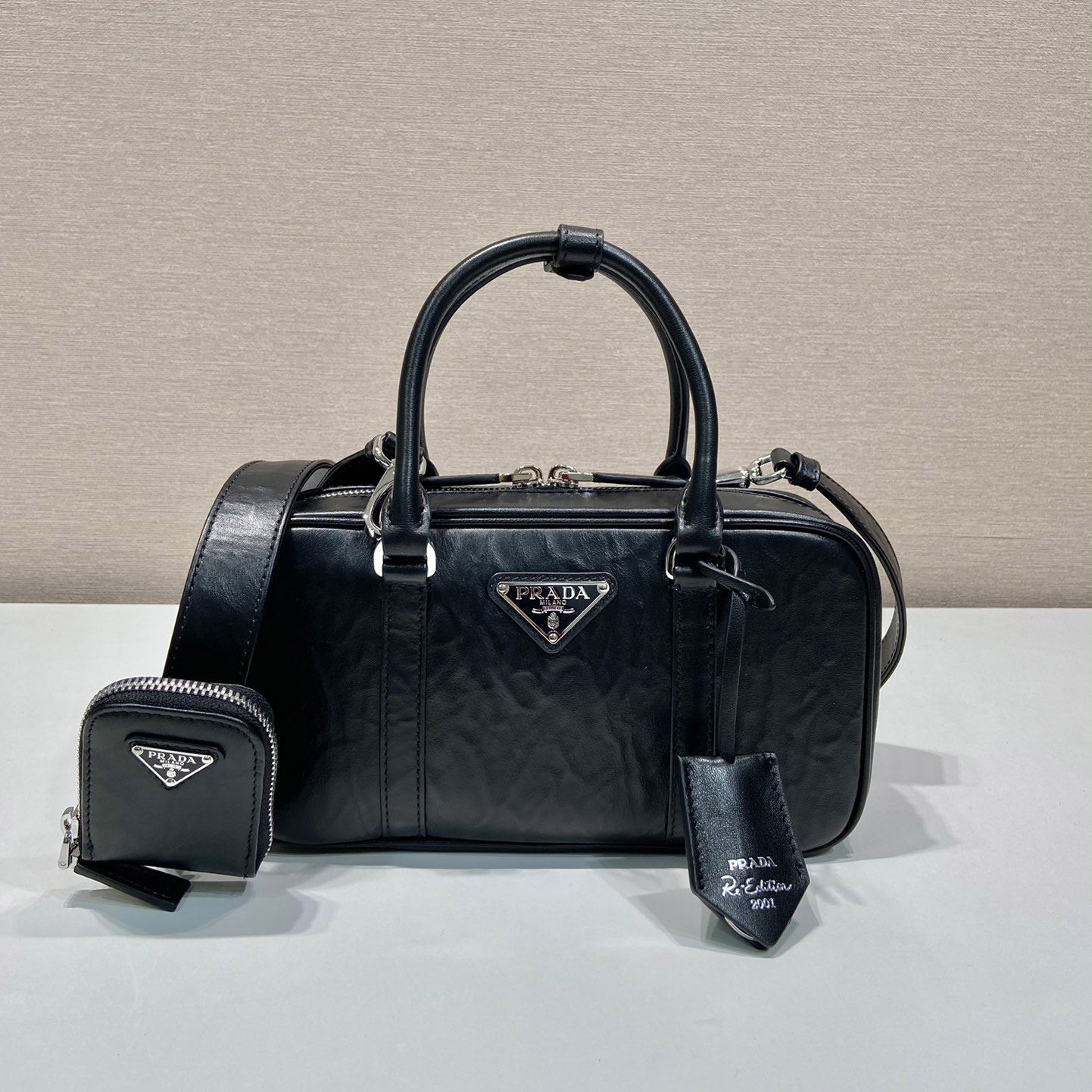 Pra*a top handle bags